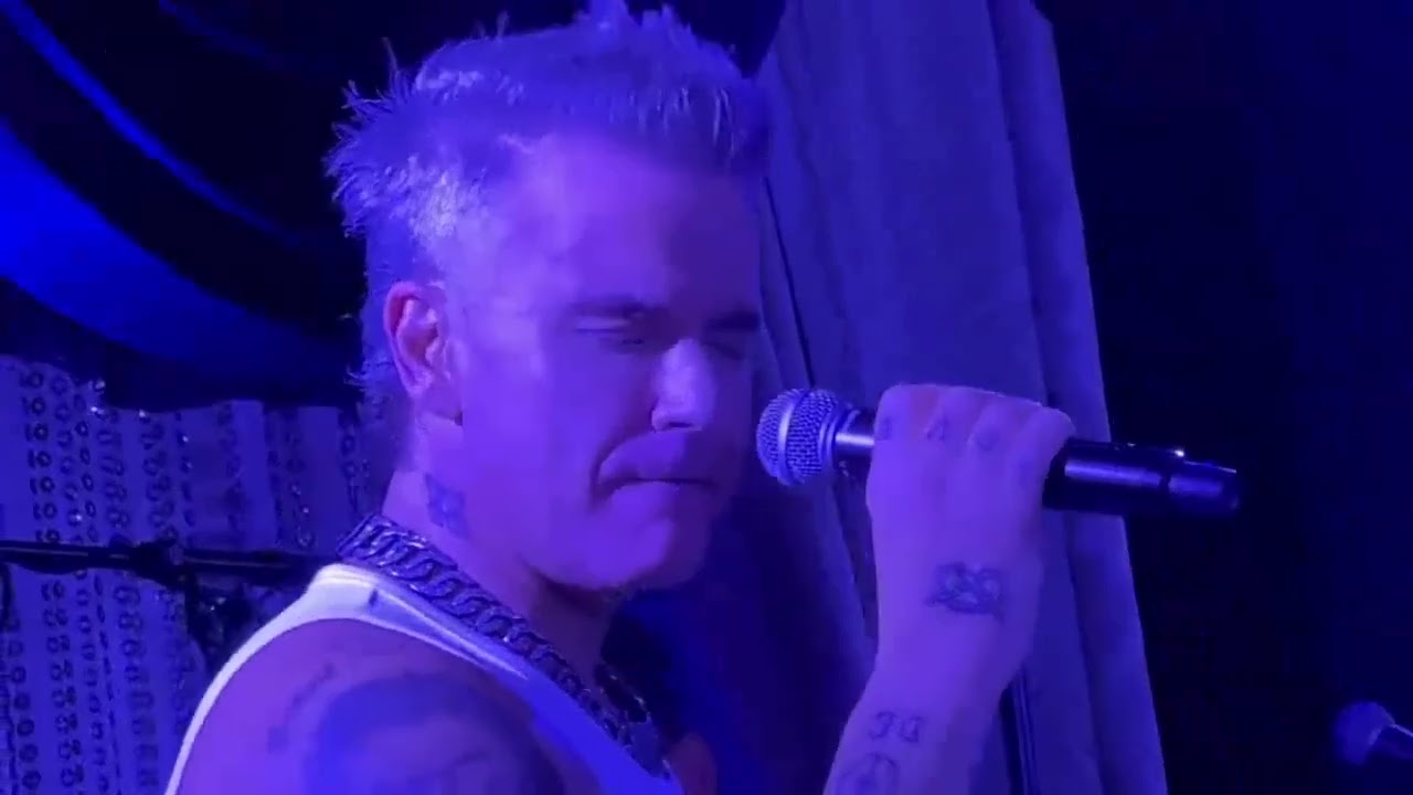 Robbie Williams Better Man premiere Toronto performing Ain’t That A Kick In The Head & Feel
