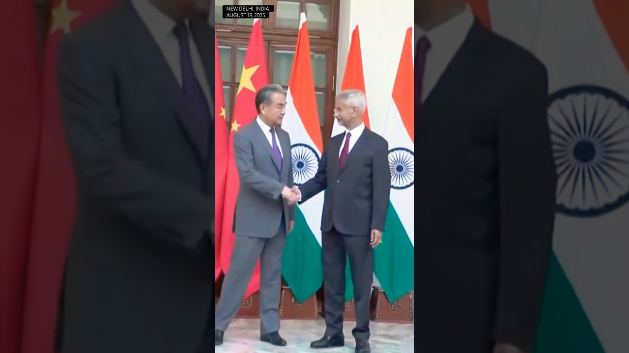 China FM Wang Yi shakes hands with his Indian counterpart Jaishankar in New Delhi