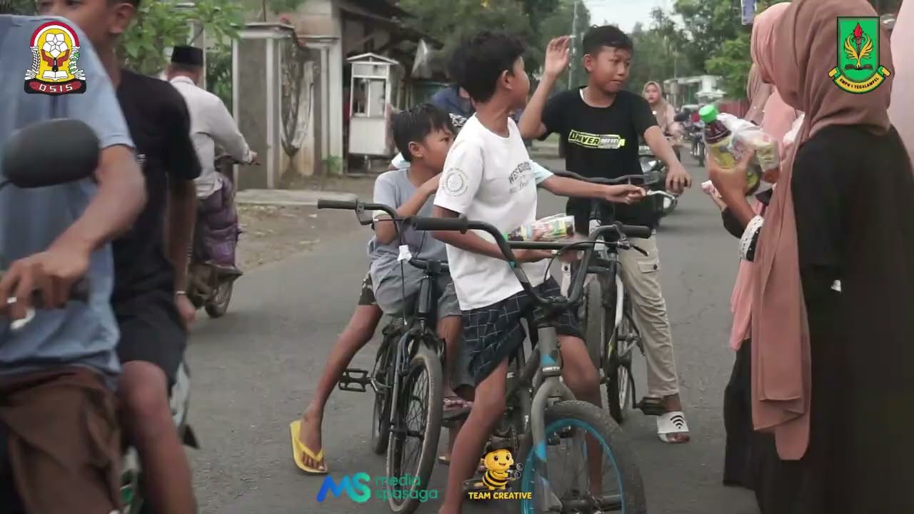 BERBAGI TAKJIL DAN BERBUKA BERSAMA OSIS SPASAGA