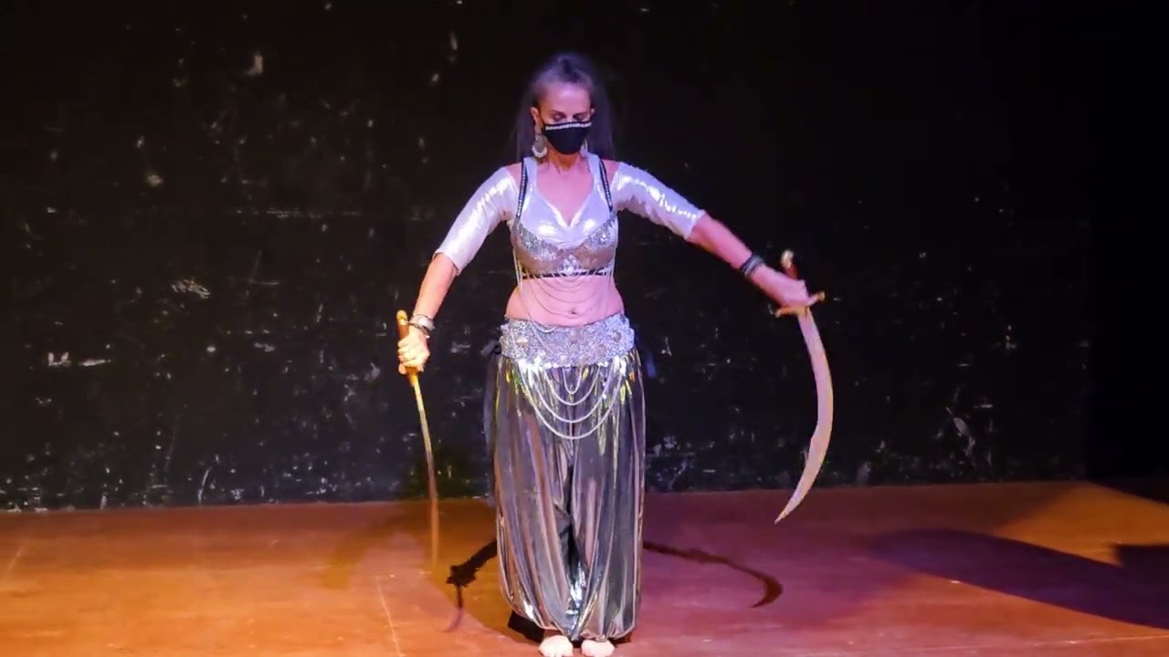 Laurie performs a choreography by Belladonna /Bohemian at the 2025 Shimmy some lovin' summer show