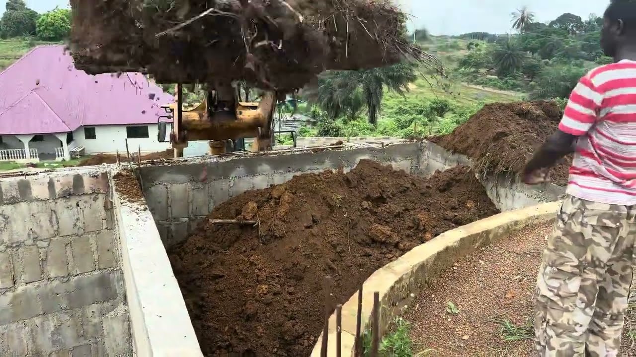 Building my house in Liberia: Backfilling In Foundation