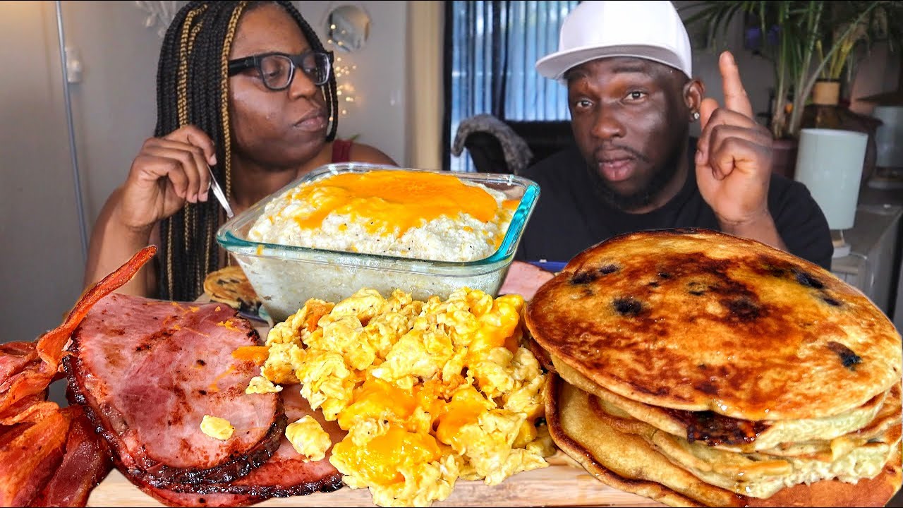 I made him EAT with a MEASURING SPOON| BREAKFAST MUKBANG| CHEESE GRITS & EGGS| BLUEBERRY PANCAKES!!