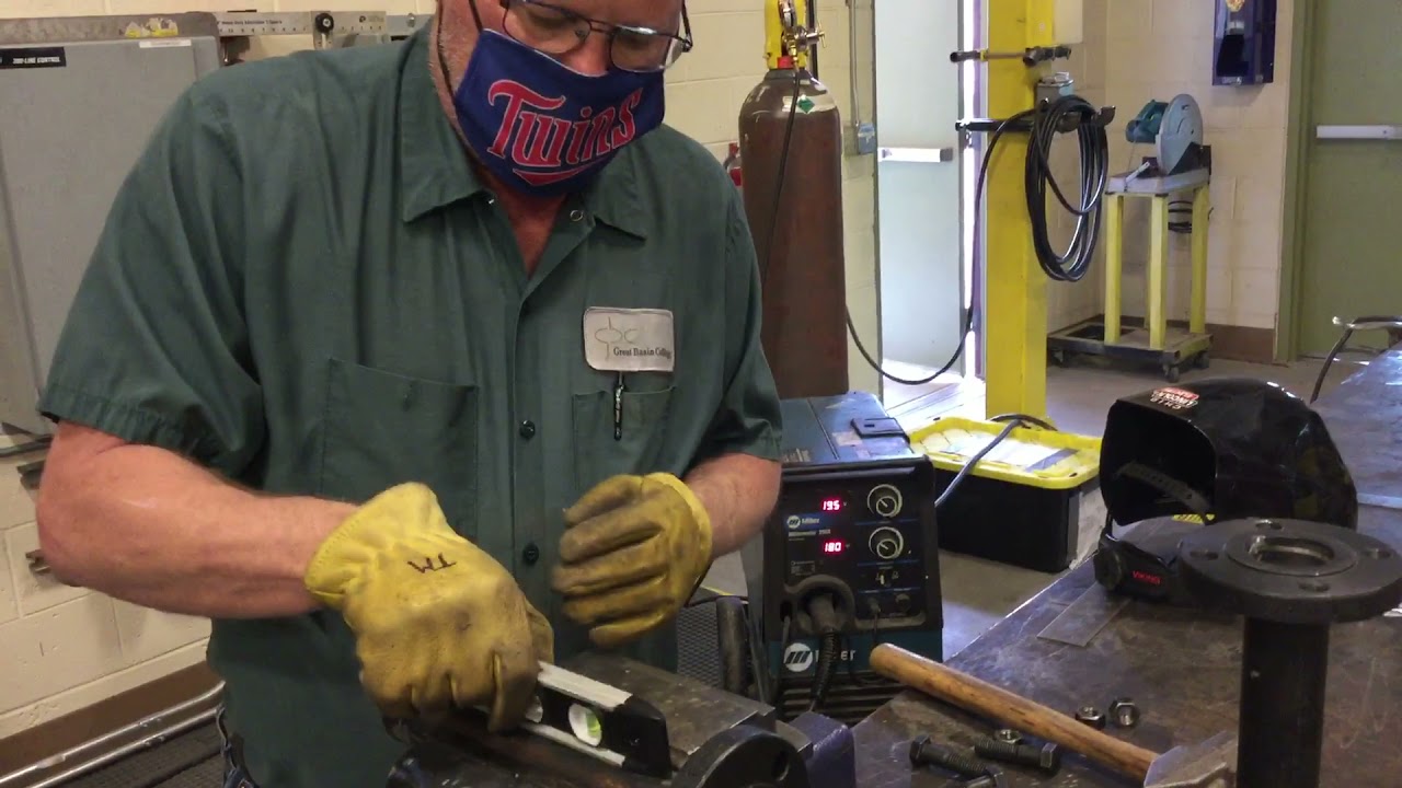 Squaring a flange for a spool piece