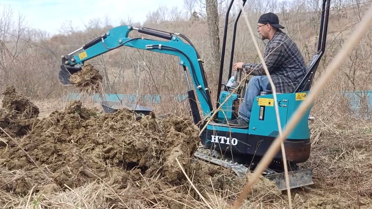 Using my Chinese mini excavator RE building a swale pt. 1