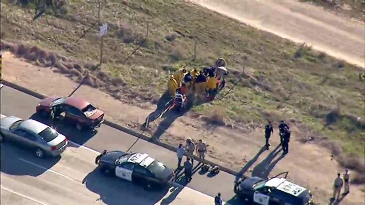 FULL RAW: Police dog tackles car jacking suspect, suspect captured near San Diego
