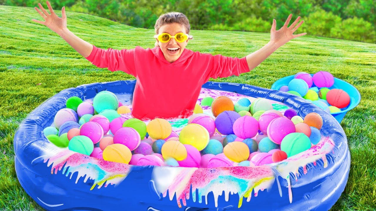 10,000 BATH BOMBS VS BACKYARD POOL CHALLENGE (Pond Monster Spotted)