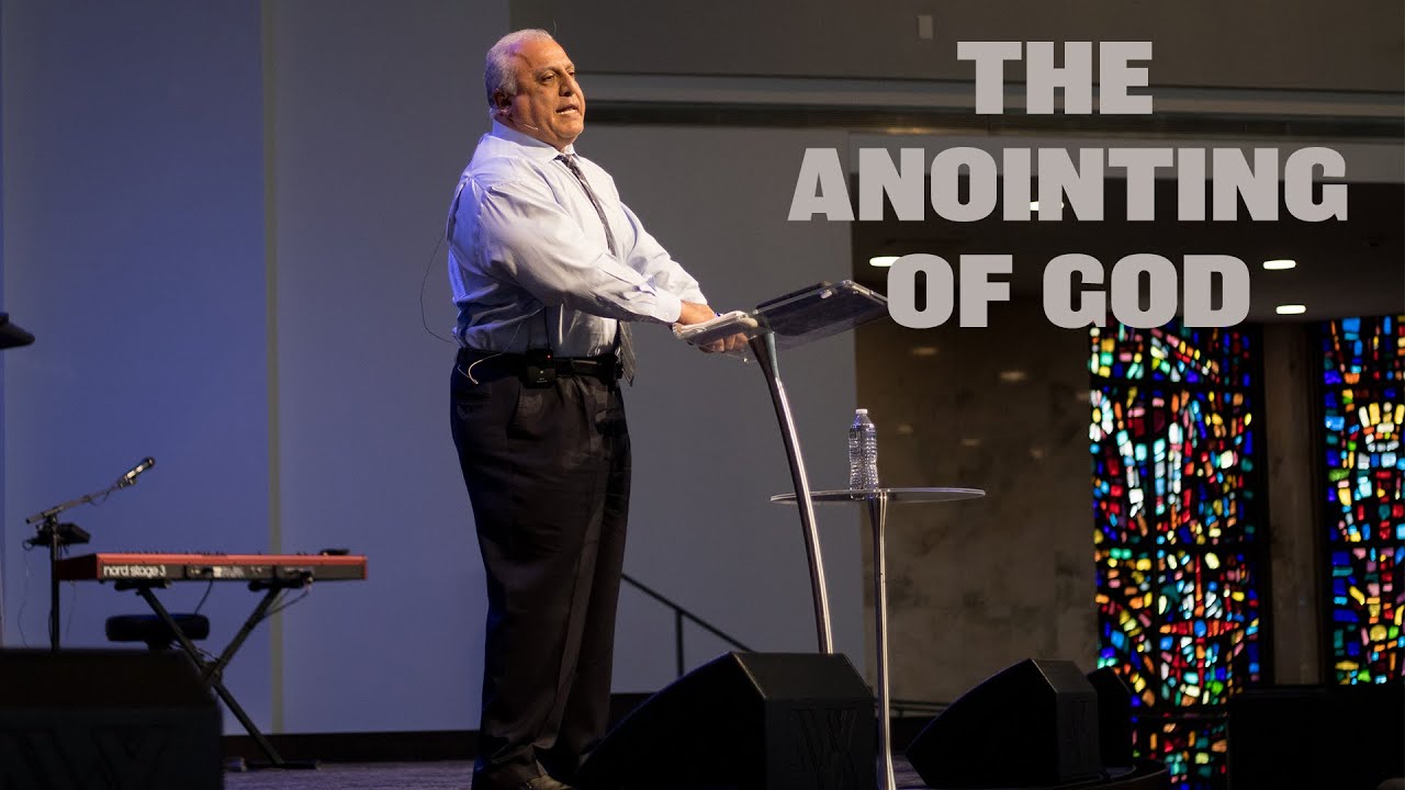 Bishop Ric Gonzalez preaching 
