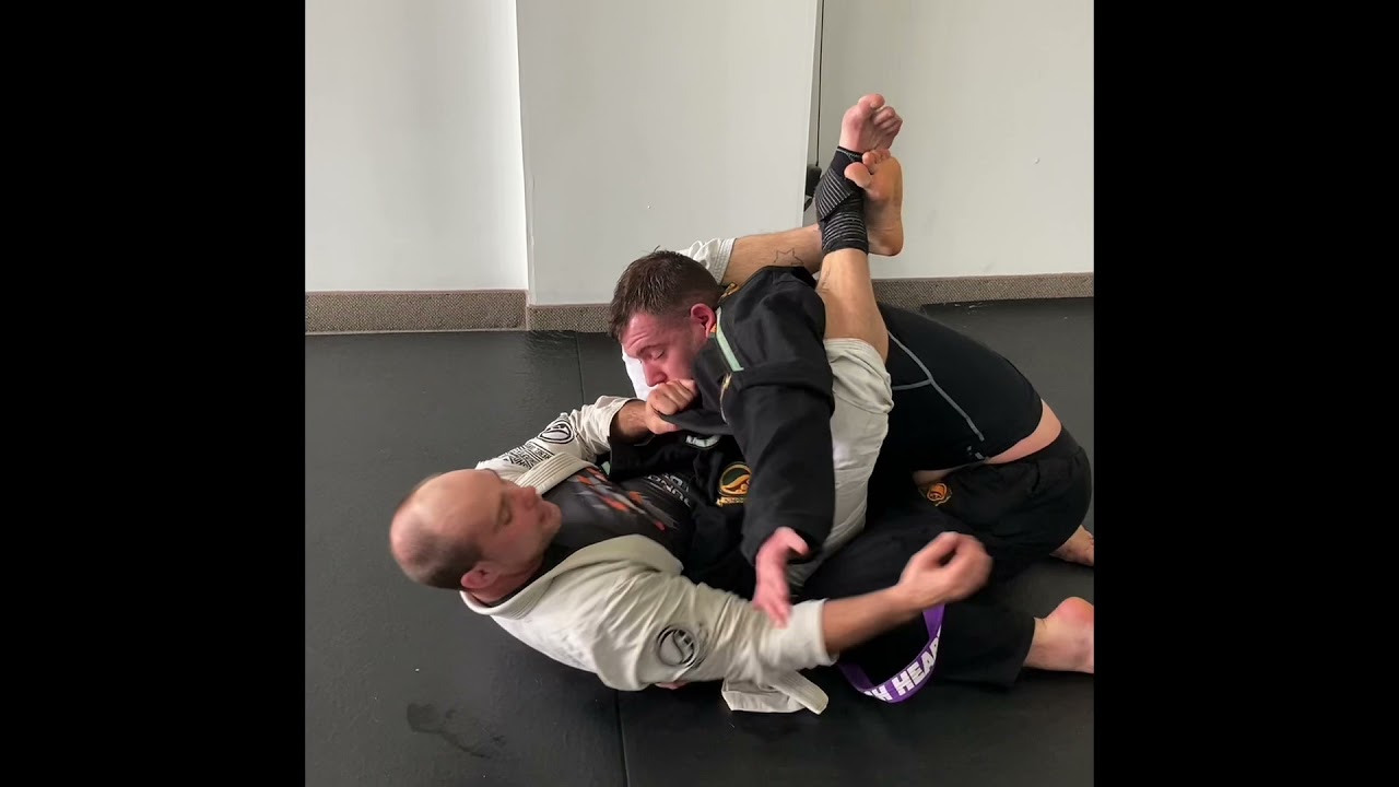 TrickyBJJ Academy: Pit Stop Shot Gun Armbar - Pant Grip Detail