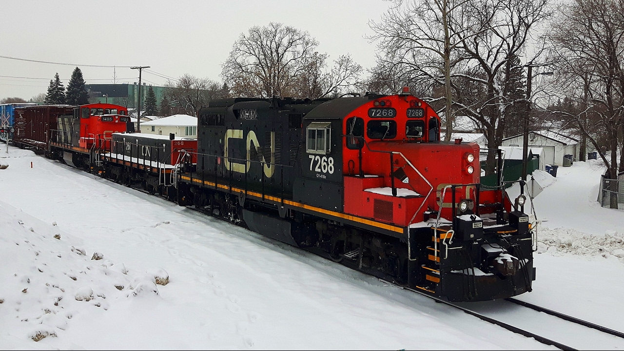 [4K] Very Old GP9 and Rare GMD1 Locomotives Hauling Local Freight Through Snowy Weather (01/30/2017)