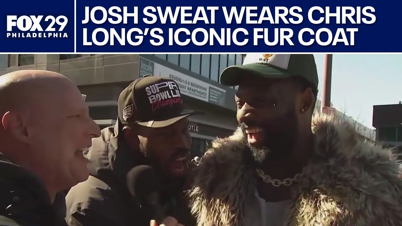 Josh Sweat rocks Chris Long's fur coat from Super Bowl LII parade