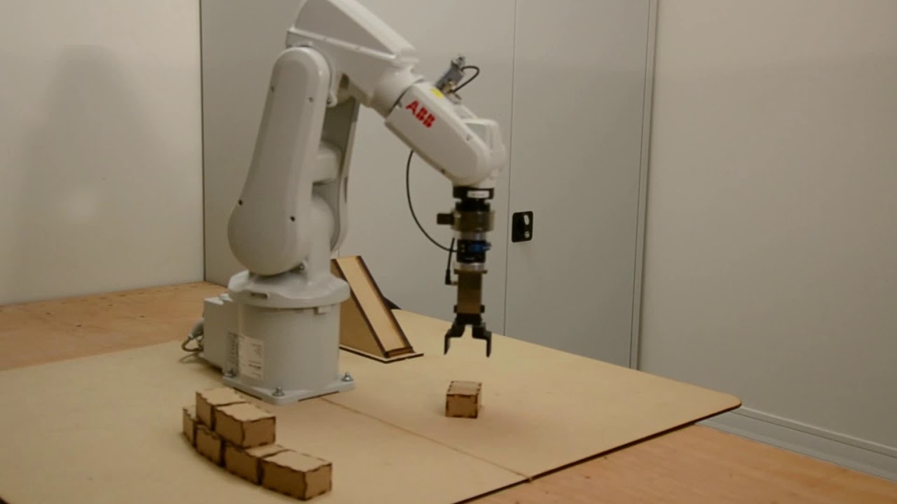 Virtual Training for a Real Application: Wall Robotic Construction