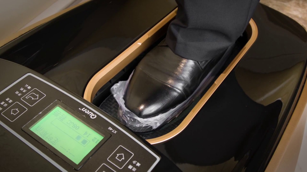 Automatic shoe cover dispenser