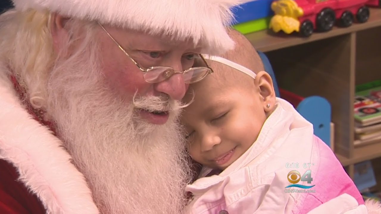 Santa Visits Kids At Miami Cancer Institute Celebrating Holiday Season