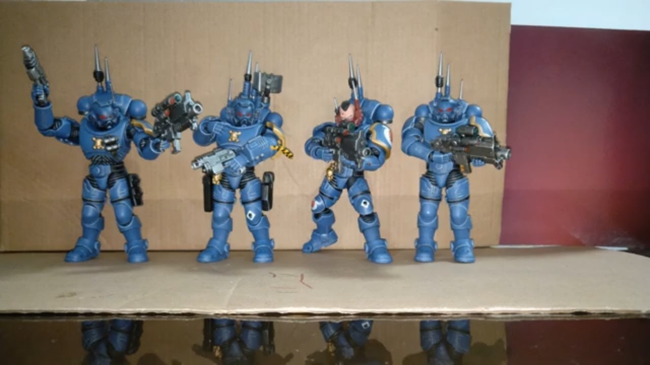 Joy Toy X Warhammer 40k 1:18 scale infiltrators action figures.  More amazing 1:18 scale awesomeness