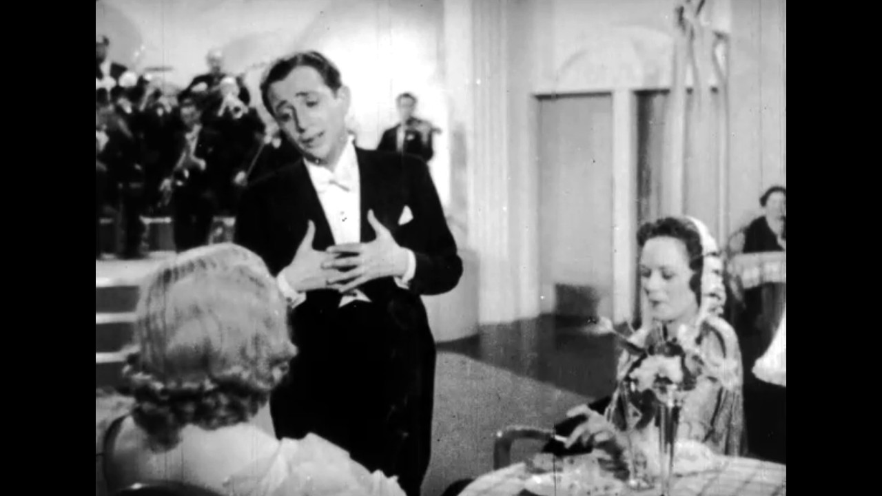 Harry Roy and his Band Perform Rhythm Racketeer and Seven Different Sweeties a Week, 1937 F1099