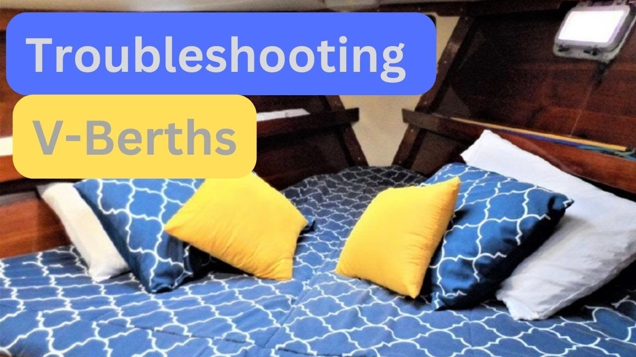 Putting Sheets on a V-Berth Bed