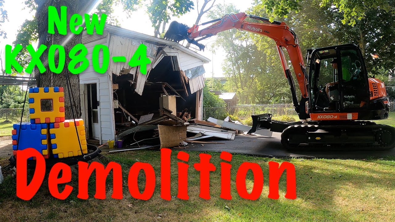 Garage demolition and removal with Kubota kx080 excavator