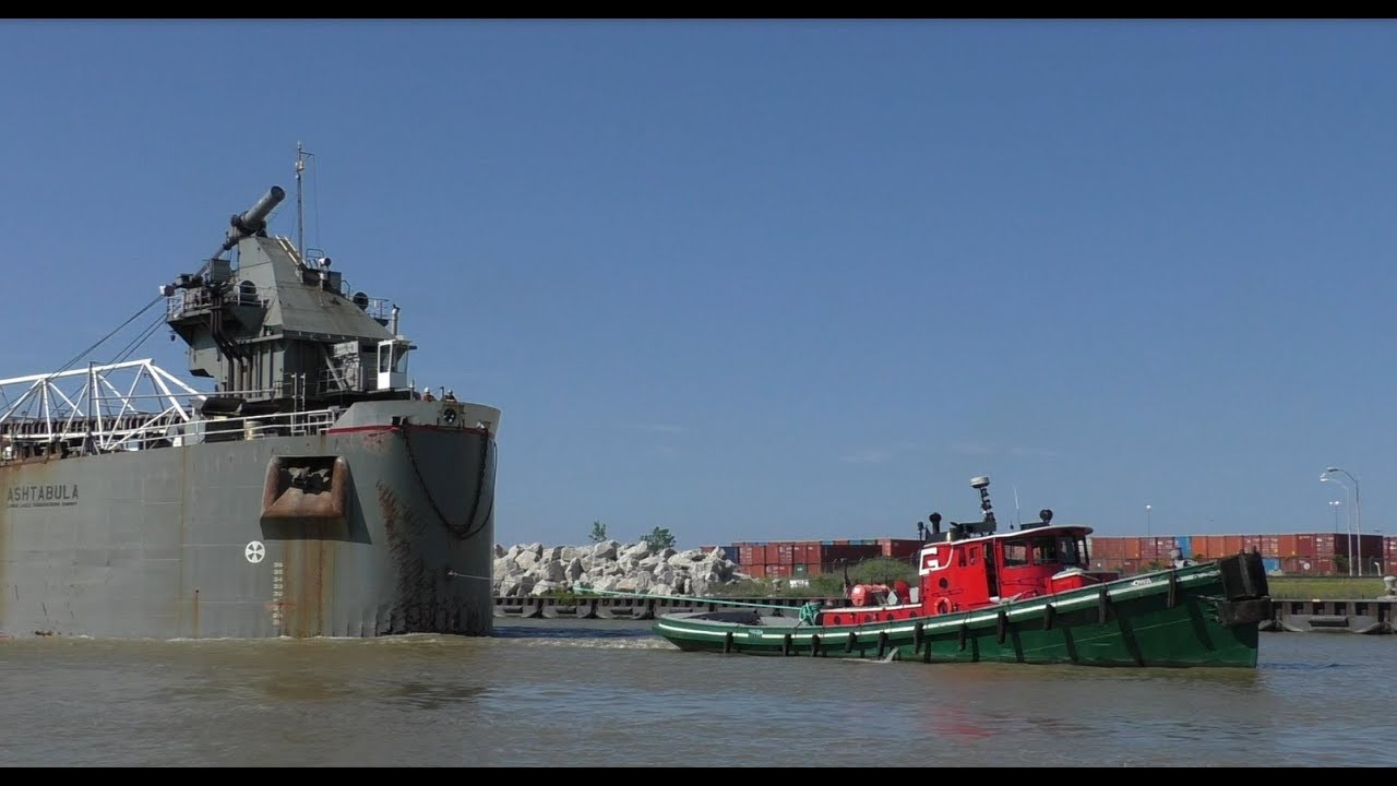 Cleveland lift bridge with the ugliest tub on the Great Lakes and a bottle train