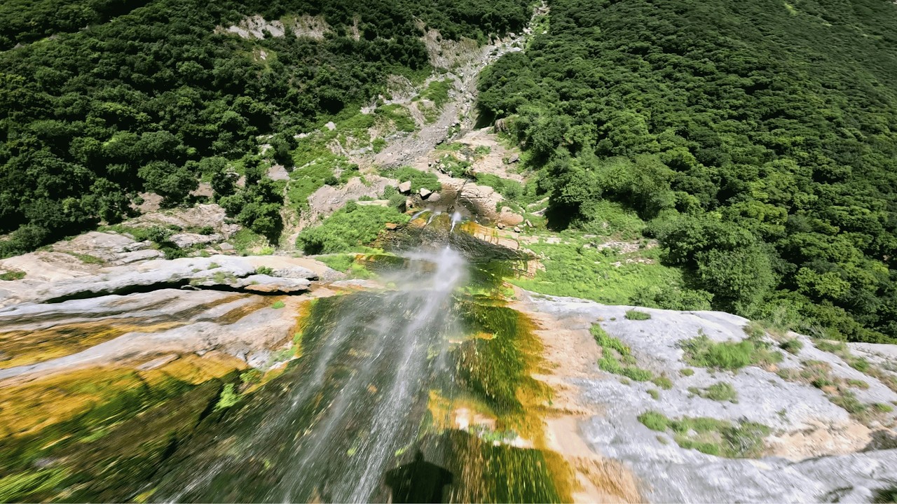 Wingsuit Flight from the Top of a Waterfall