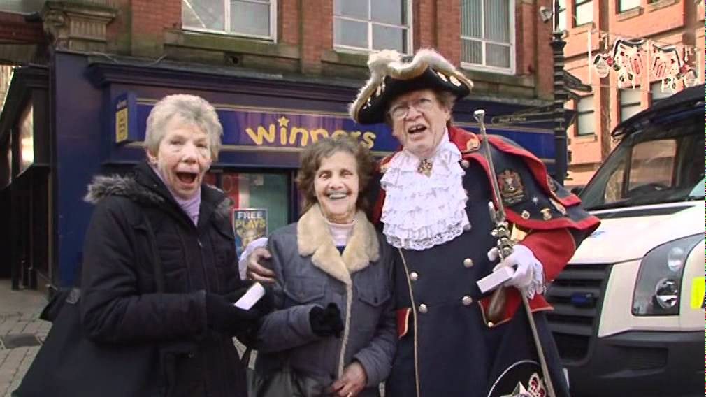 Fagin joins the town crier to remind Oldham shoppers to keep their valuables safe