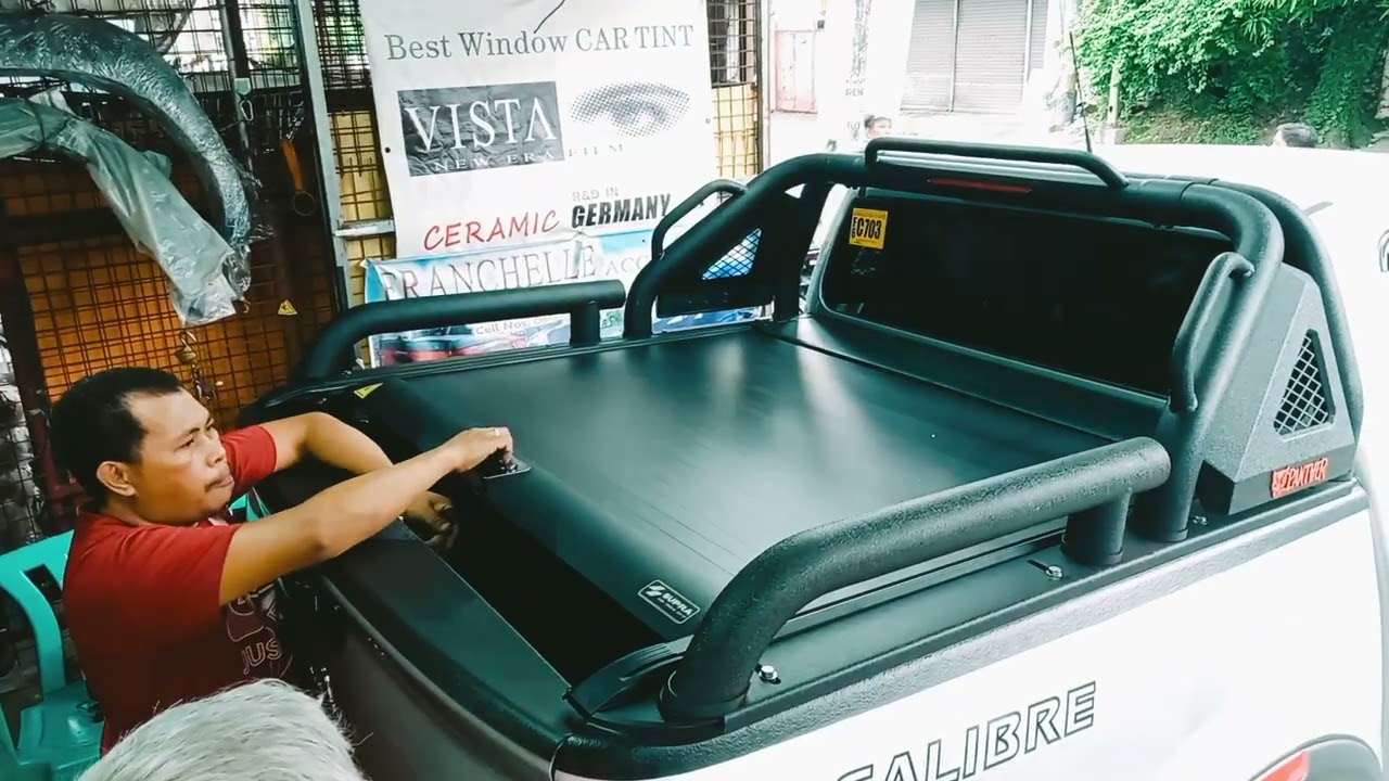 NAVARA INSTALLED ROLLER LID V3 SUPRA CODED LOCK,ROLLBAR HERCULES PANTHER.
