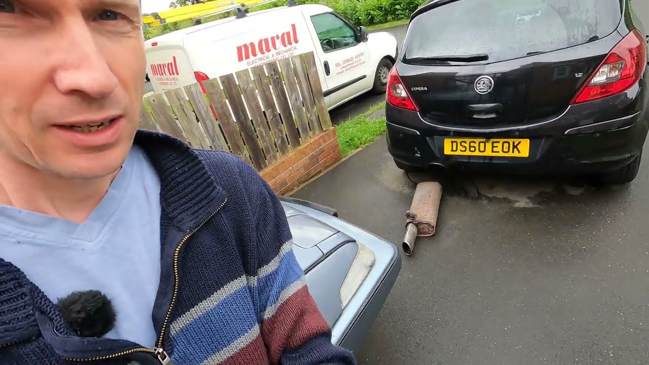Replacing the exhaust backbox silencer on a 2010 Vauxhall Corsa D Petrol