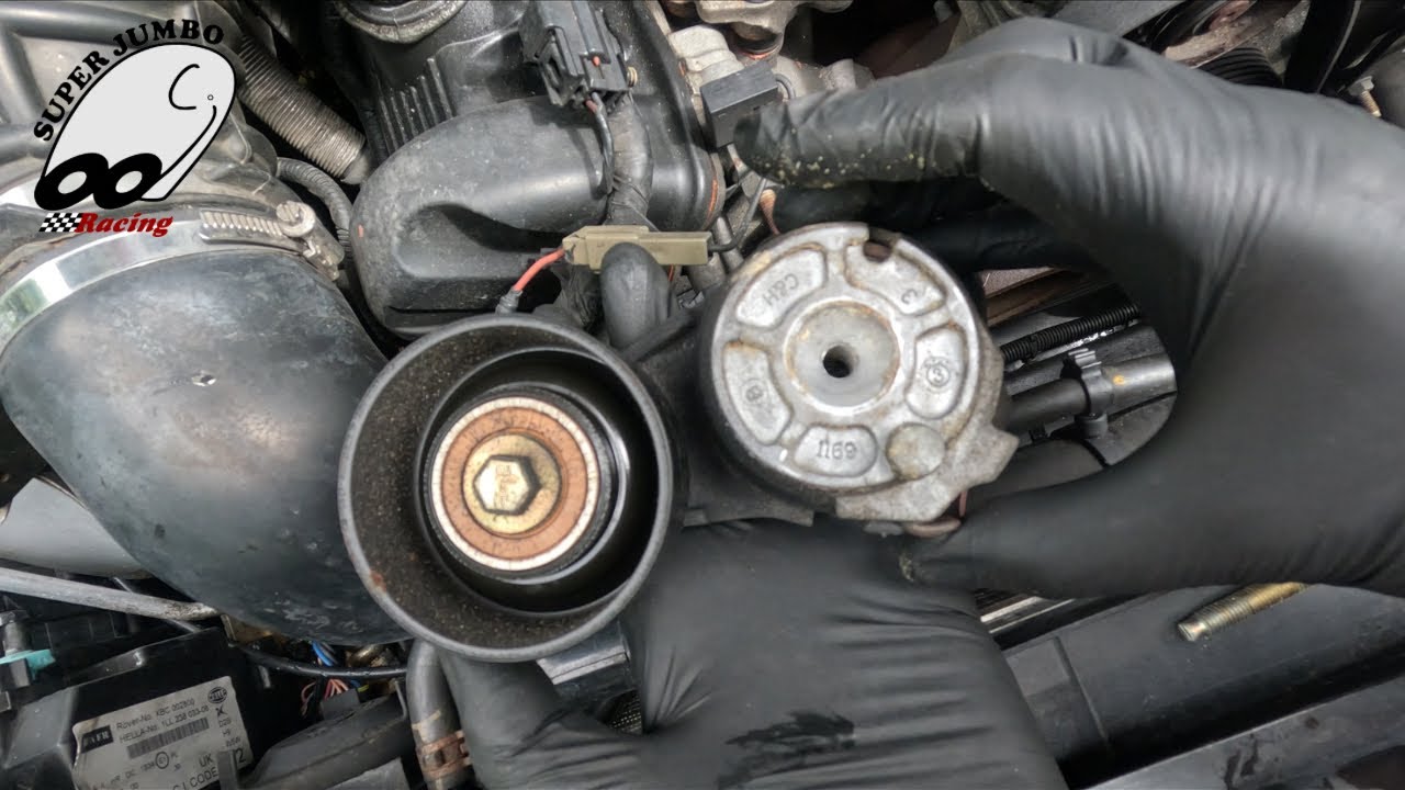 MG ZT 260: Installing a new serpentine belt tensioner & idler pulleys.