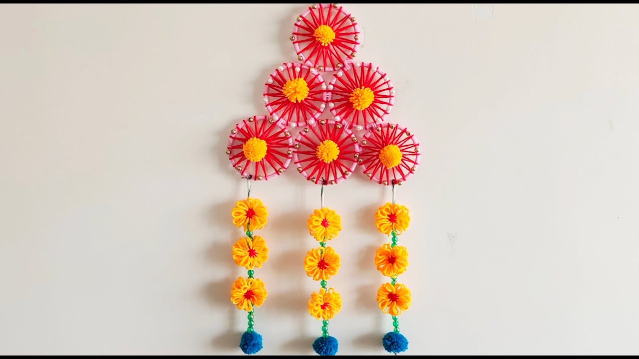 old bangles and  woolen flowers wall decor | Home decor ideas #001