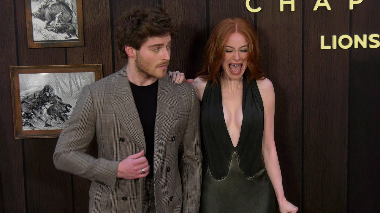 A funny moment with Madelaine Petsch & Froy Gutierrez at the premiere of 