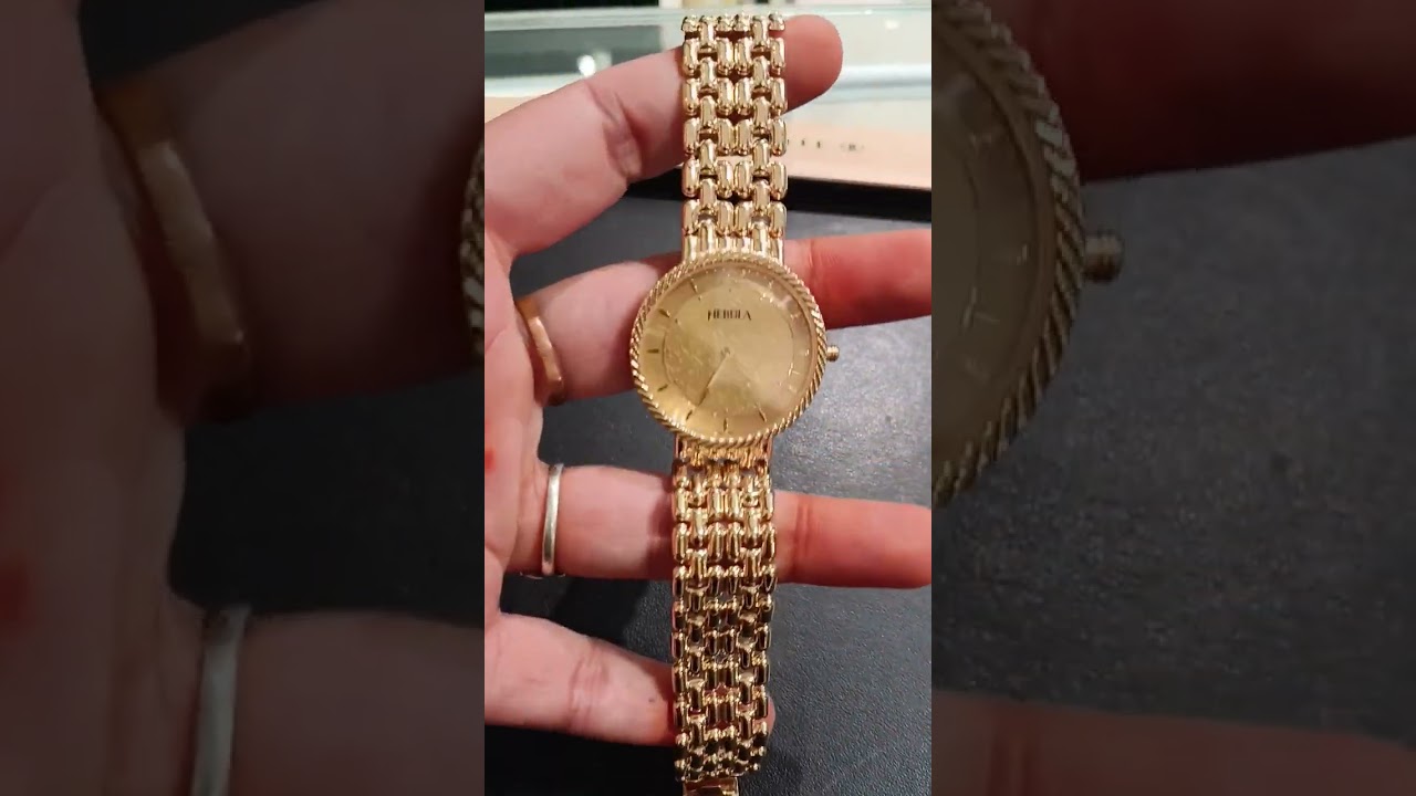 18 carat gold nebula collection lifetime warranty Titan