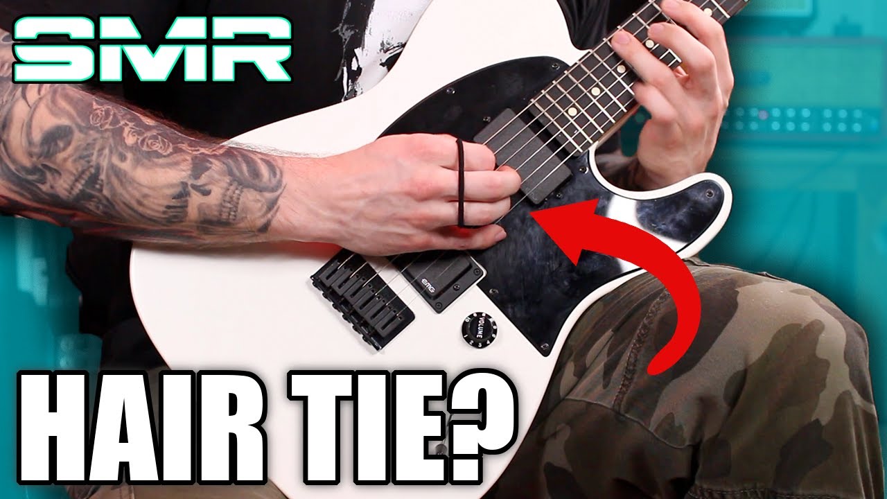 WHY JIM ROOT WEARS A HAIR TIE ON HIS HAND