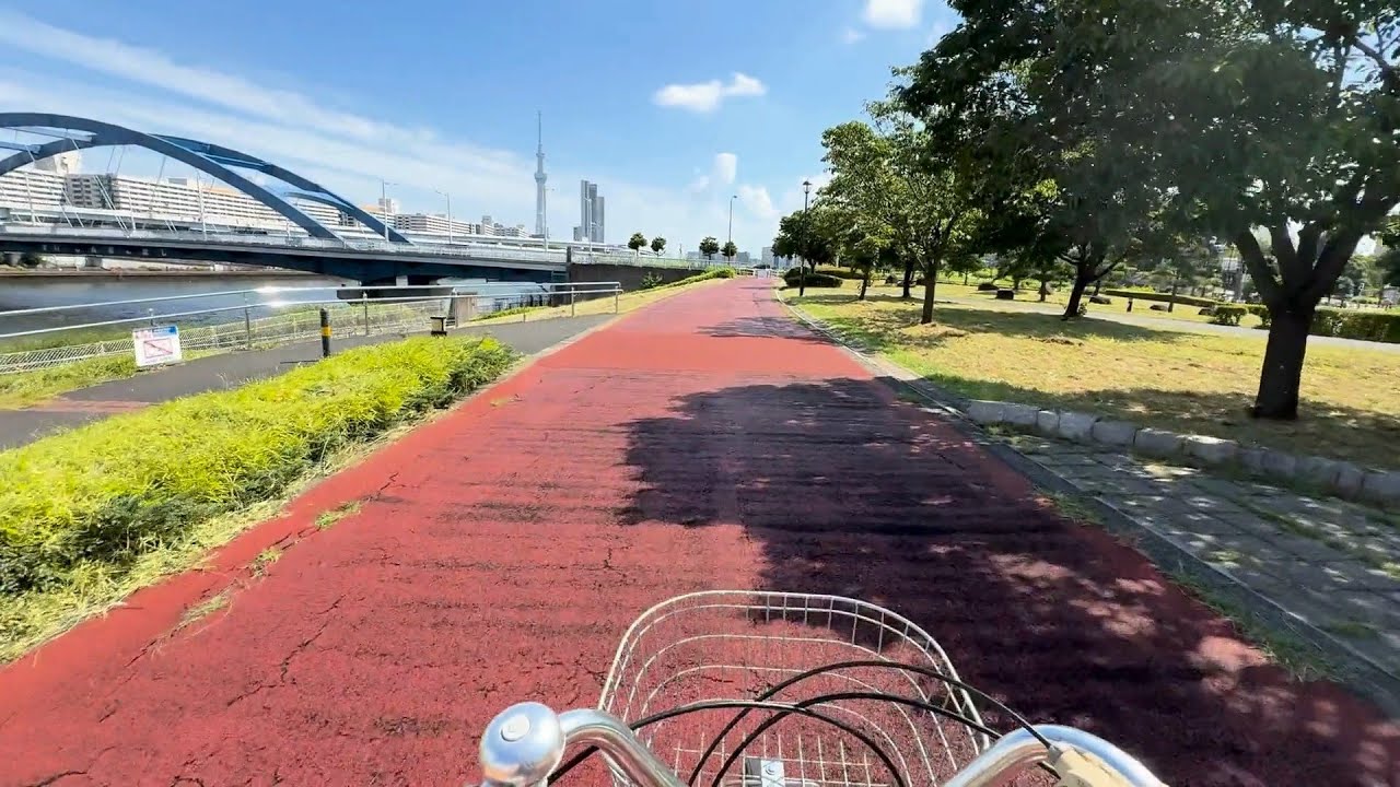 Cycling along Sumida River in Tokyo