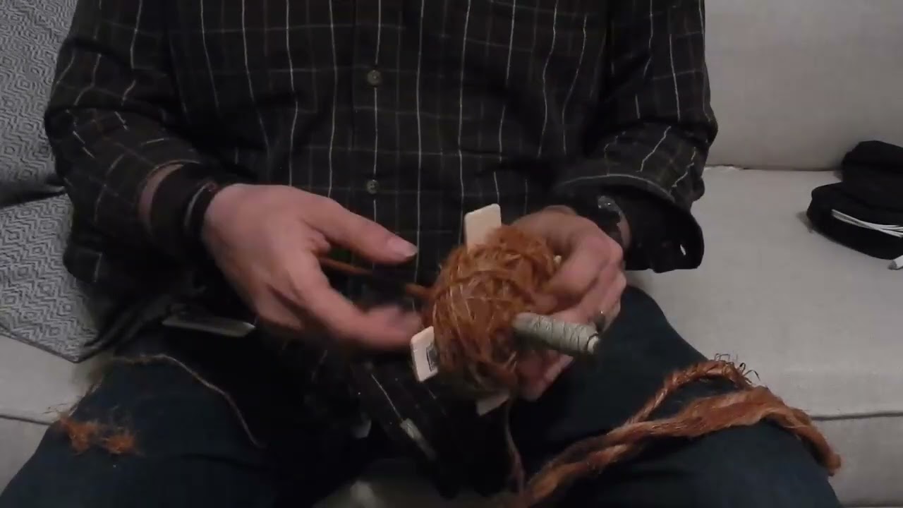Spinning combed dogbane line fibers