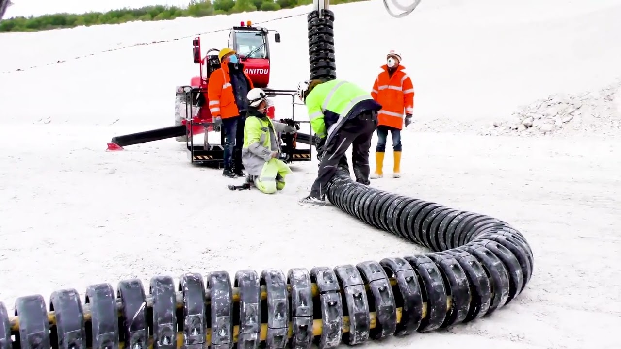 igus - e-loop&reg; energy chain guides arm-thick cables safely to the bucket wheel excavator