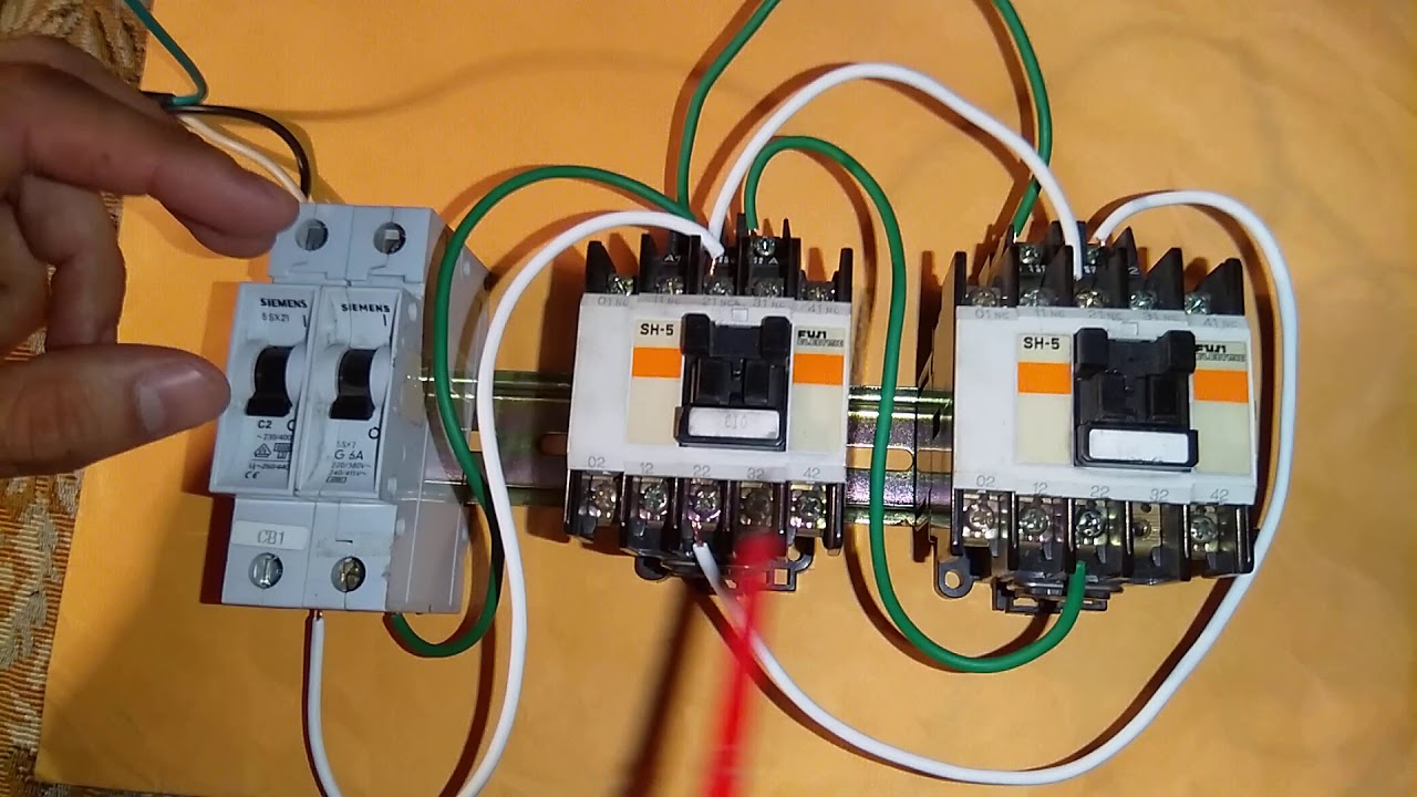 Enclavamiento eléctrico de dos contactores