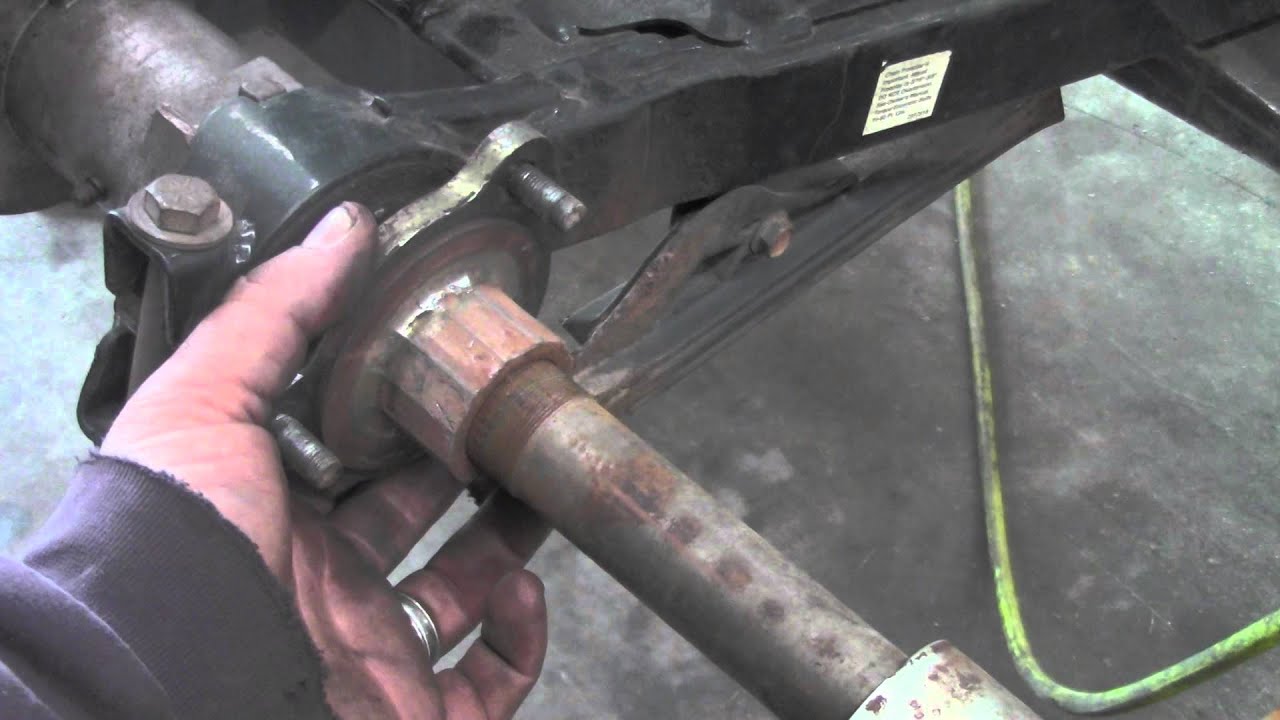 Removing the Rear Axle From a 2000 Polaris TrailBlazer ATV