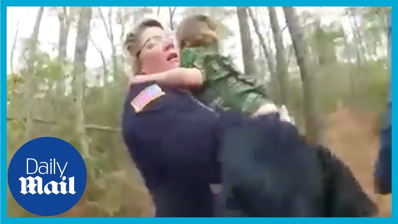 Terrified four-year-old boy rescue in woods with dog captured on police bodycam