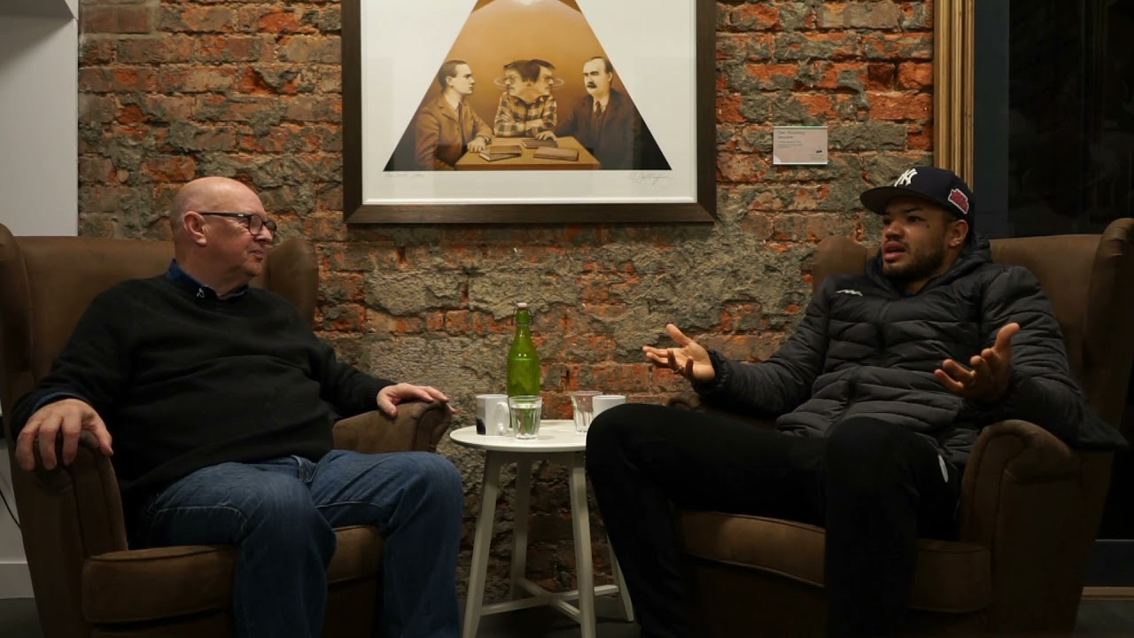 Scéalta | Joe Austin in conversation with Tommy McCarthy | Féile An Phobail | Fáilte Feirste Thiar