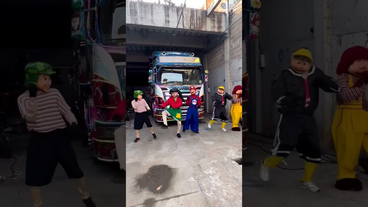 Personagens da Carreta Conex&atilde;o da Alegria dan&ccedil;ando 