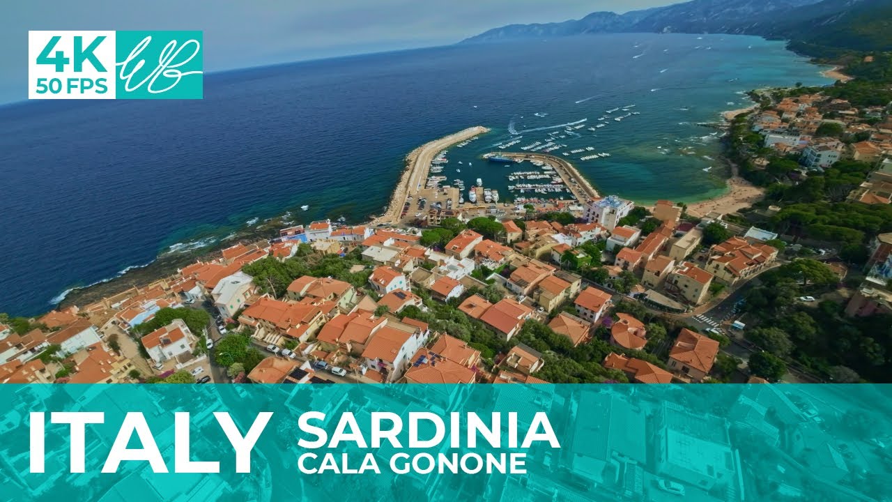 Cala Gonone, Sardinia, Italy. Cinematic flying an FPV drone over the port. 4k.