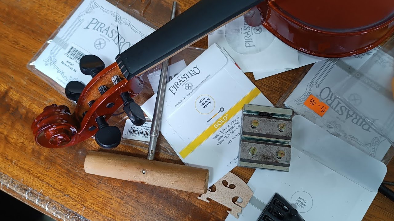 Ajuste de clavijas de violín