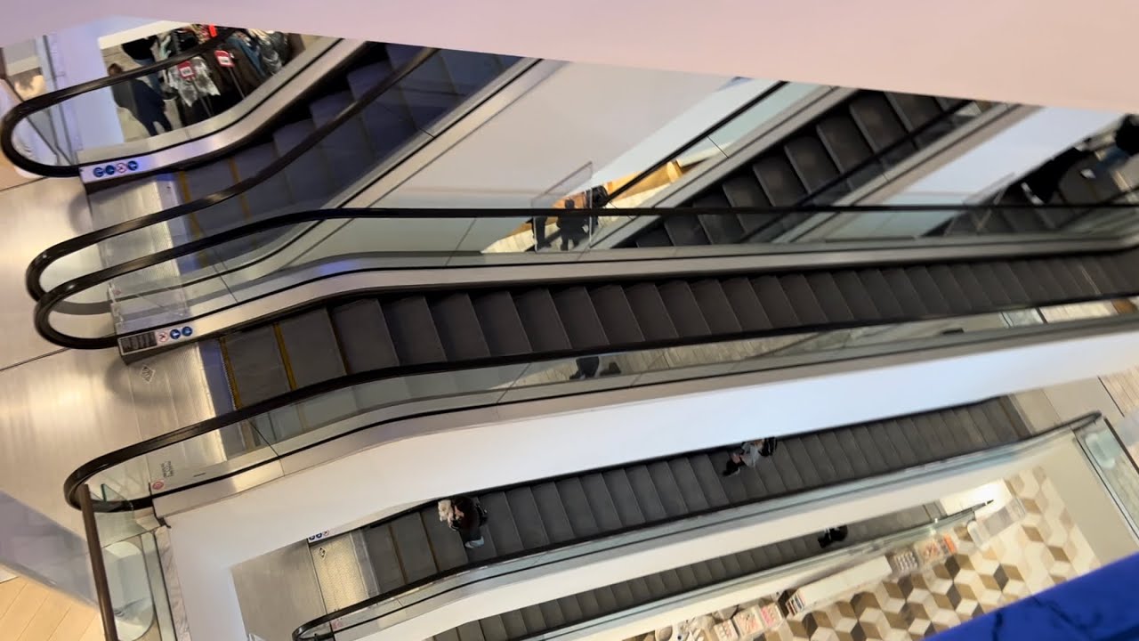 Manchester, England. 8x O&K KONE escalator ride at Selfridges Department store, Market St / Arndale