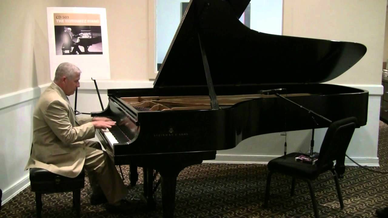 ANDY KAHN performs 