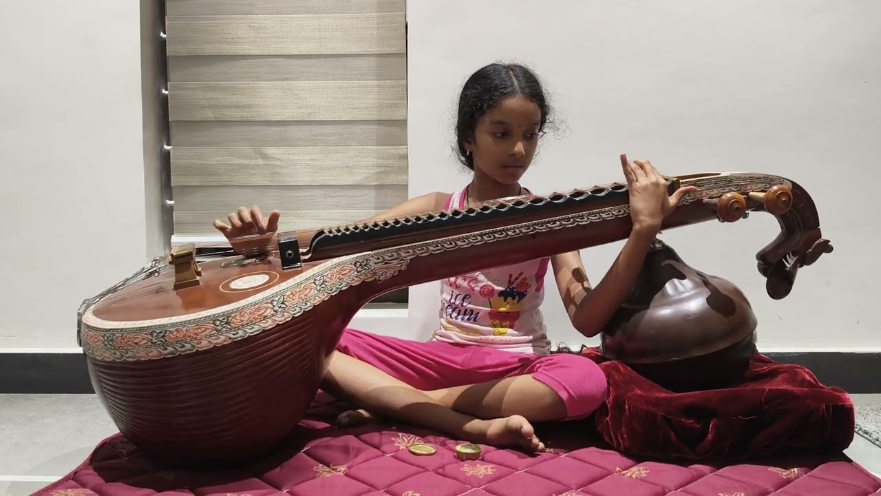 कलाकार वीणा वादन 
