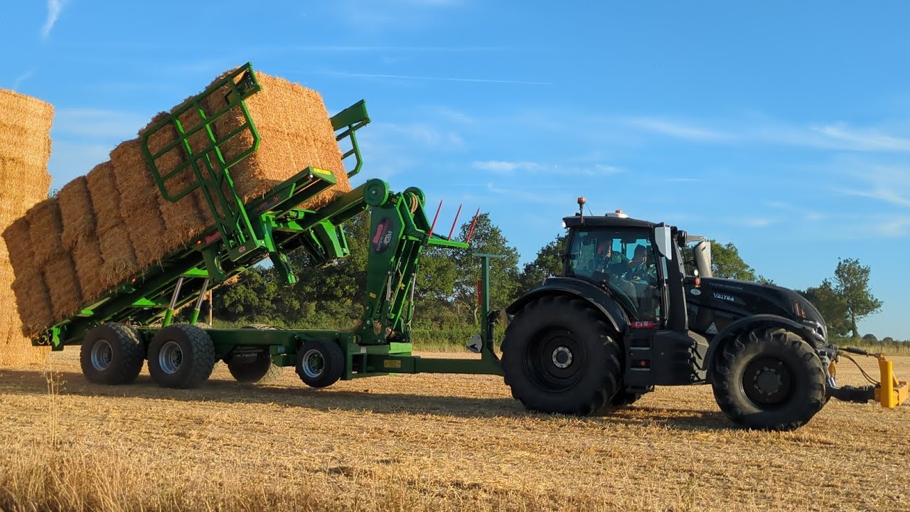 JOHN DEERE 7R BAILING AND VALTRA CHASING BALES 