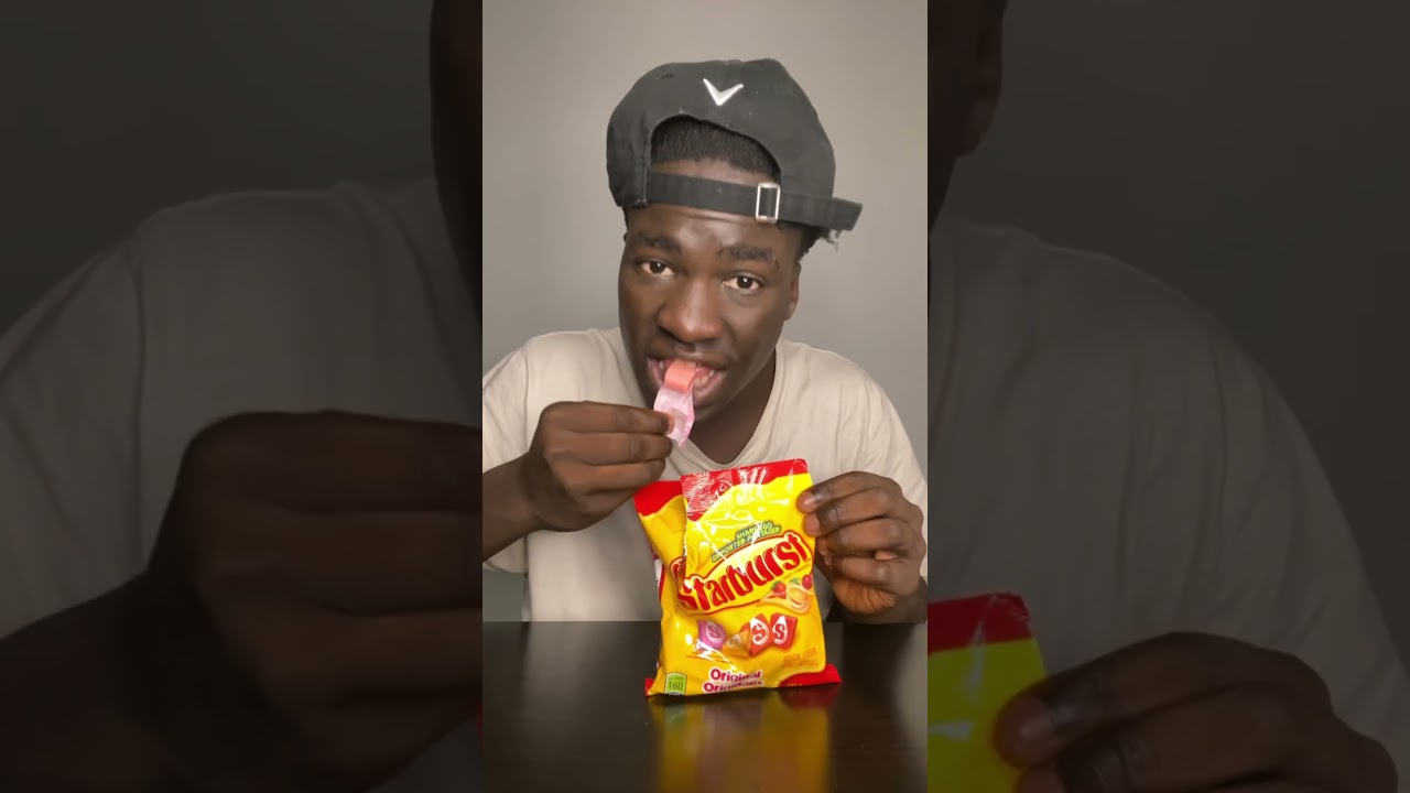 Black man eats starburst candy for the first time