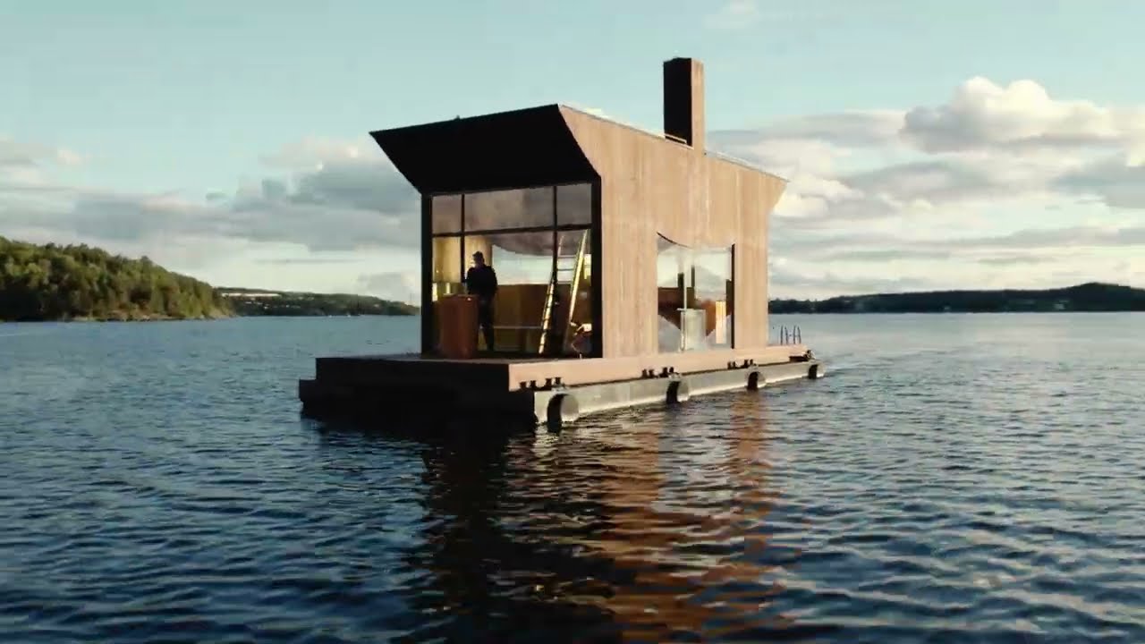 wooden boat sauna by sandellsandberg sails on stockholm archipelago