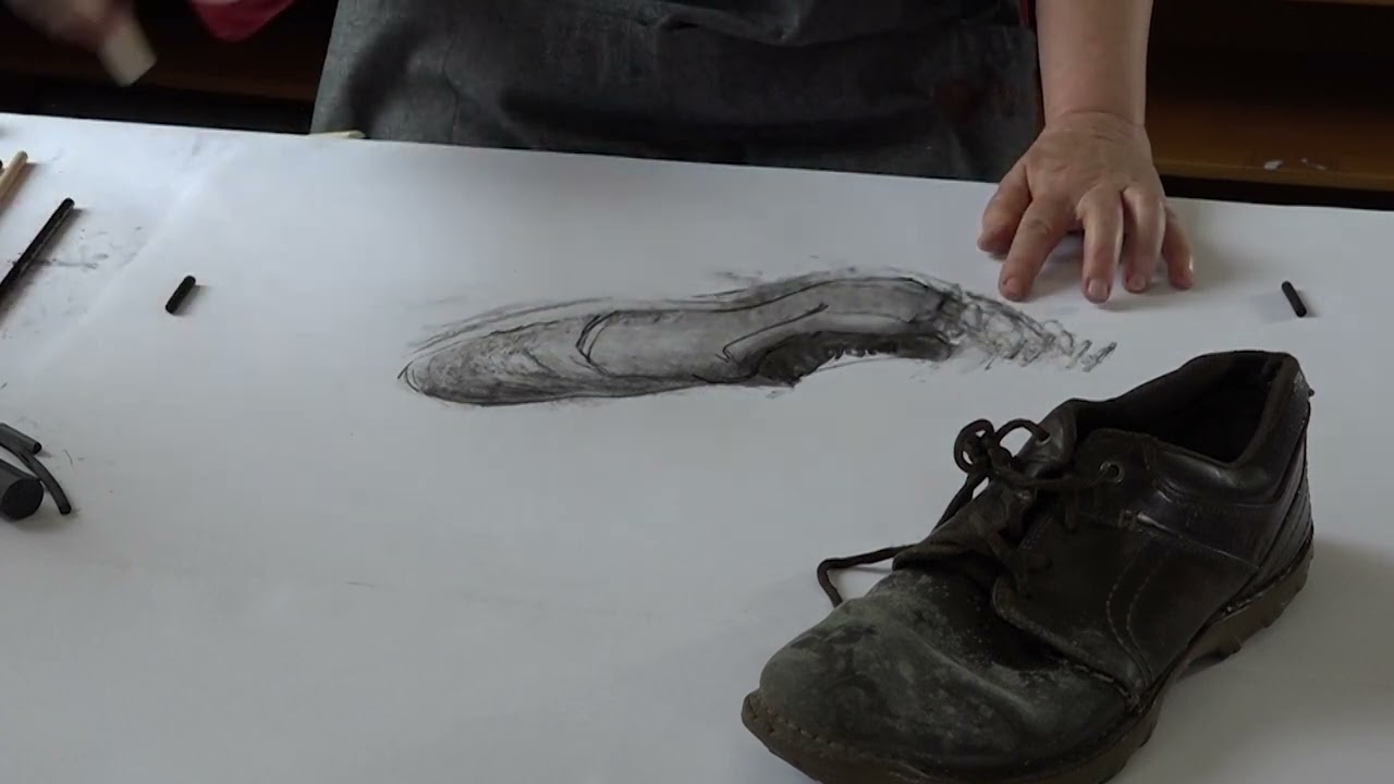 Dr Gwen Miller drawing an organic object.