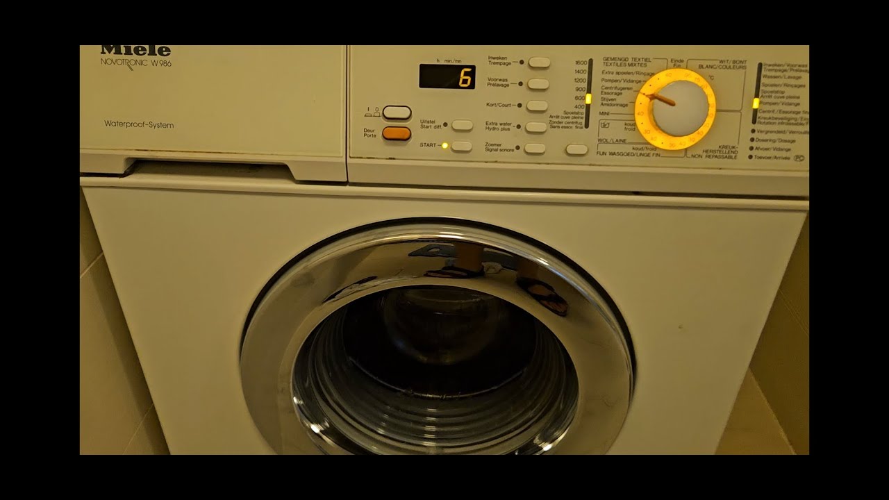 How to replace the distribution v-belt on a Miele W986 washing machine (Italian with EN subtitles)
