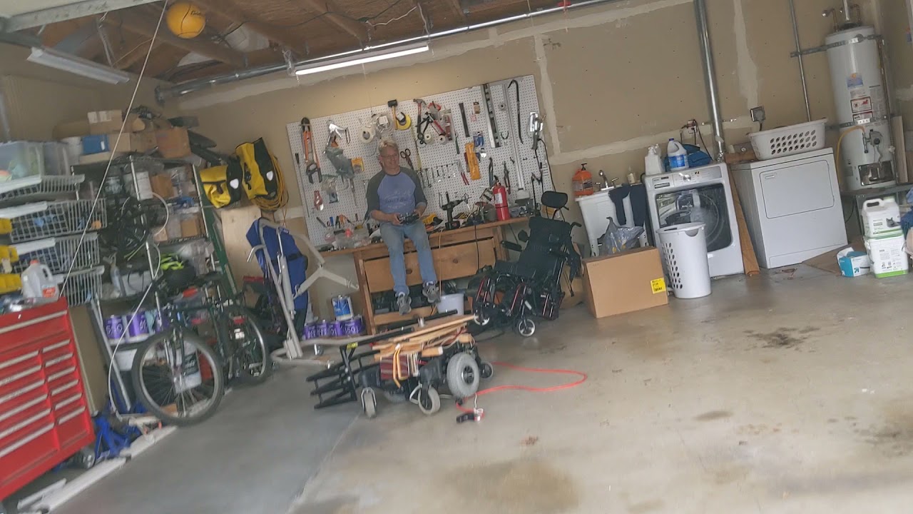 Power soccer chair with independent cage